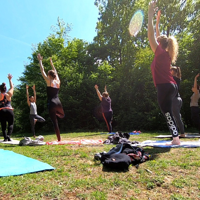 Picture teaching Yoga outdoor